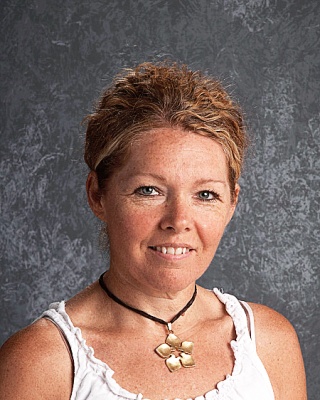 A portrait of a staff member